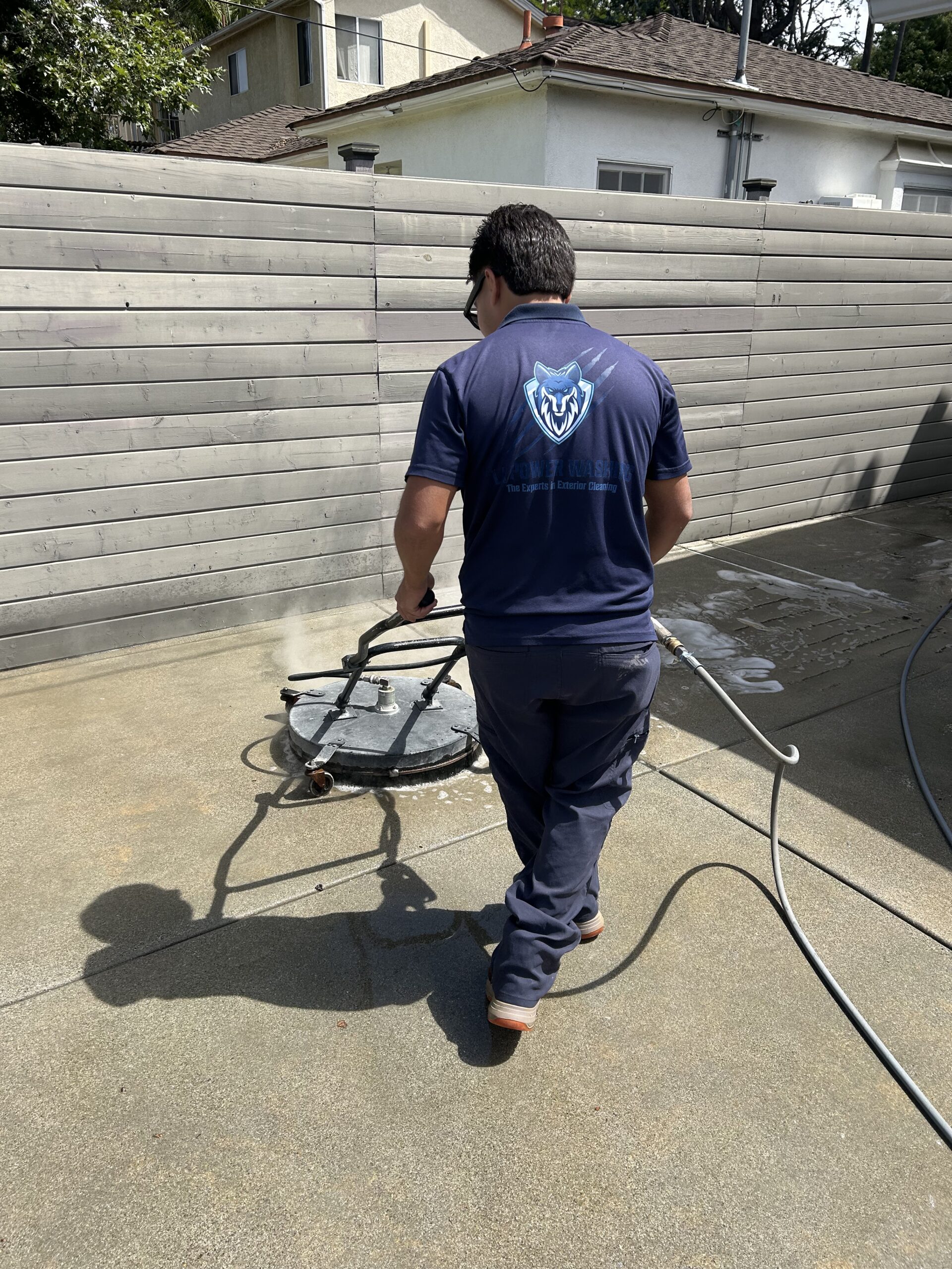 Concrete pressure washing with a surface cleaner in Long Beach, CA